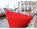 Wooden motor yacht for sport fishing